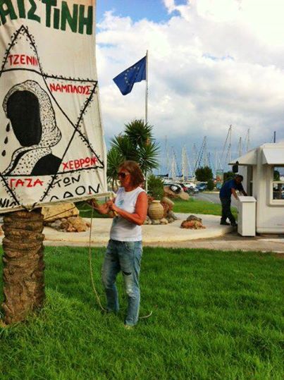 Tzipi Livni vandalizes Greek Pro-Palestinian poster